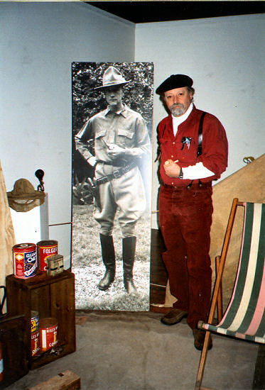 Thom Ross steps into a camp scene with a life-size view of Roy Chapman Andrews from the "Explore Art!" exhibit.